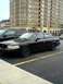 1999 Ford Taurus - This 1999 Ford Taurus is seen from the side in a parking lot.
