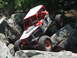 1967 Ford Bronco - A custom-built buggy navigates a rocky trail, with another vehicle visible in the background.