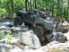 1967 Ford Bronco - This modified 1967 Ford Bronco navigates a challenging rocky terrain during an off-road excursion.