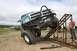 1990 Chevrolet Suburban - A modified truck navigates an obstacle course, demonstrating its off-road capabilities.