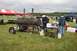1990 Chevrolet Suburban - Outdoor event with a large smoker grill on a trailer and people gathered around.