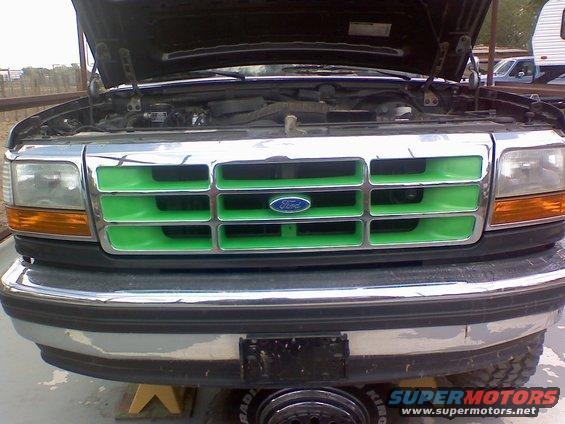 Green grille on 1993 Ford Bronco with hood open