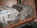 1970 Ford Mustang - Two aluminum engine blocks are shown, one with handwritten identification marks including '2 of 2' and 'SOHC'.