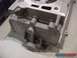 1970 Ford Mustang - Close-up view of a metal engine block part, showing casting details and texture.