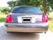 1998 Lincoln Town Car - Rear end pic w/ my color matched painted SCT emblem and my recently added Cartier trunk emblem. Exhaust tips are just c…