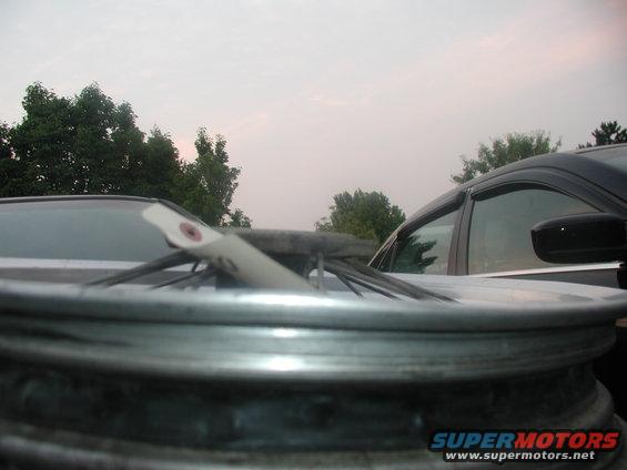 Motorcycle wheel with a white tag attached