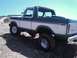 1978 Ford Bronco - This 1978 Ford Bronco is shown from a three-quarter front angle on a dusty, off-road trail.