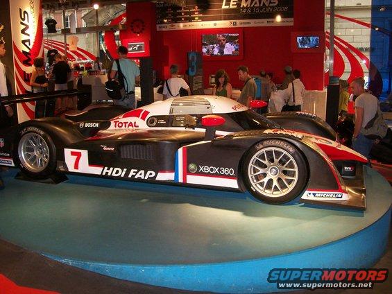 Racing car with number 7, Total, and Xbox 360 logos. Le Mans 2008 event