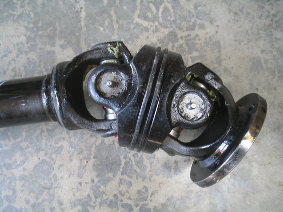driveshaft with two universal joints and a flange on the end