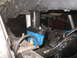 1979 Ford Bronco - Close-up of a modified suspension system, likely for off-road use, showing a blue component and differential.