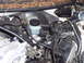 1993 Ford Probe - The brake fluid reservoir and various engine components are visible in this close-up shot.