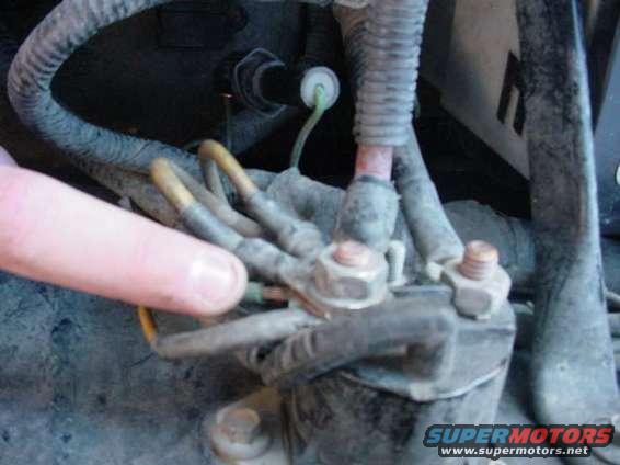 my_electrical_problem_that_i_fixed.jpg my finger is pointing to the wire that was not connected to the solenoid because there wasn't abig enough hole for the wire to fin the connecter