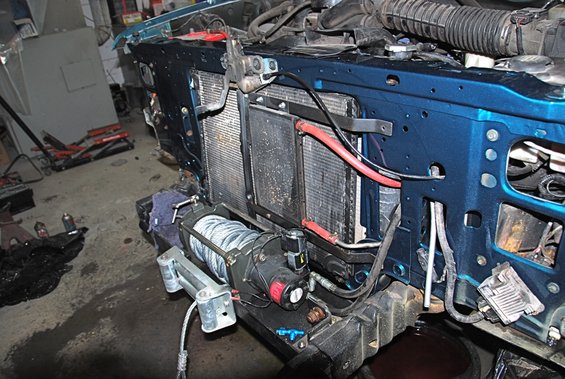 Front end of a 1996 Ford Bronco with a winch mounted
