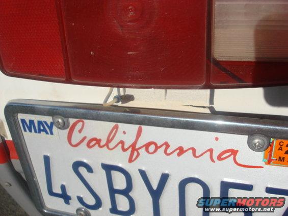 liscense-plate-02.jpg you can see the tear here