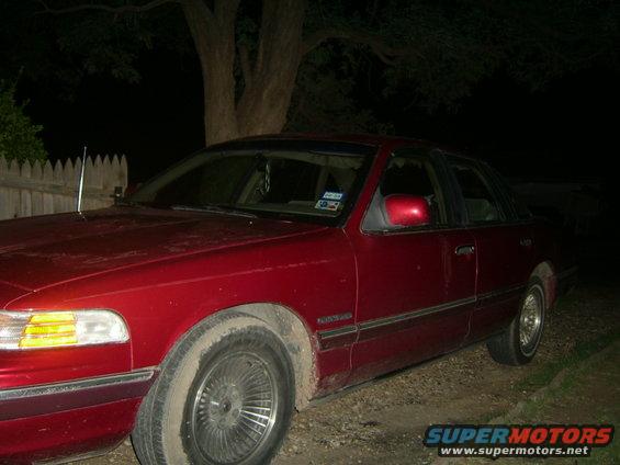 Red 1994 Ford Crown Victoria, 3q front view