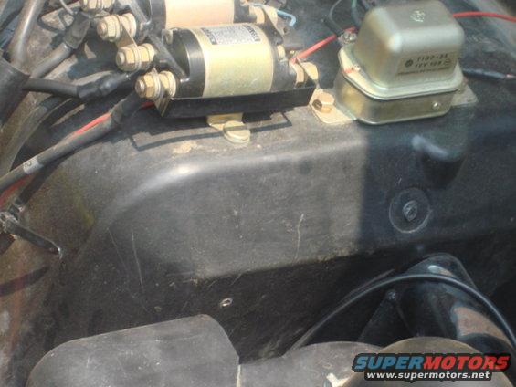 power-tap-placement.jpg I get these power taps from chevy trucks and suburbans at the junk yard. i needed to find a spot that was out of the way and flat and large enough to hold the tap. this space looked good to me it was perfect.