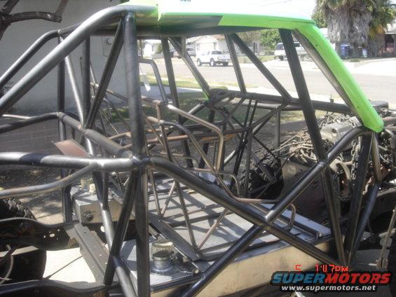 Custom roll cage interior with green accents