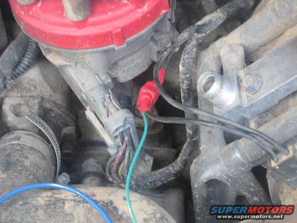 even tho i dont use my a/c, i hooked the green wire to it anyways just in case i decide to hook it up someday. the blue wire is taped to it.