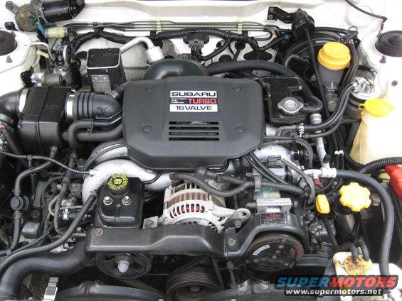 Engine bay with 'SUBARU TURBO 16VALVE' cover visible