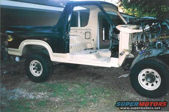 body_rf.jpg At the lower corner of the firewall, you can see the rubber cowl drain valve for the A/C fresh air intake.