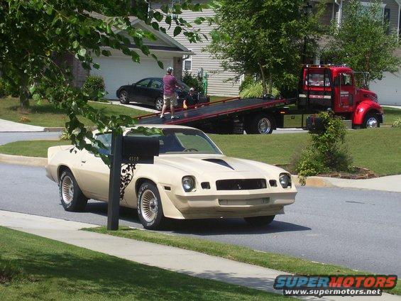 Tan 1979 Chevrolet Camaro with skull decal, 3/4 front view