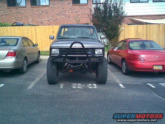 Gray SUV front with brush guard and lifted suspension. 1984 Ford Bronco II