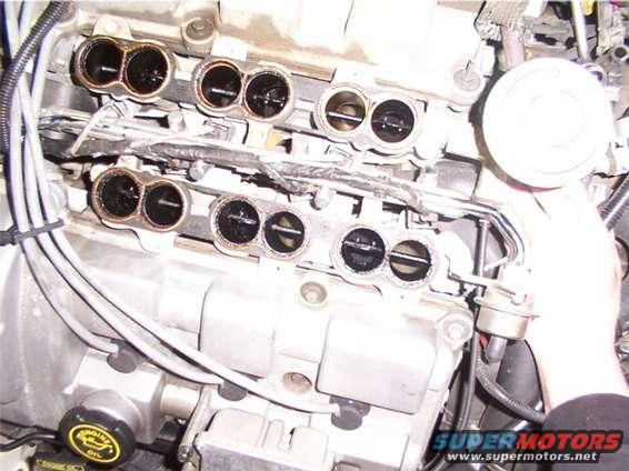 secondaries_open.jpg Another great shot of the intake only secondaries open.