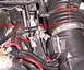 1998 Ford Taurus - Engine bay components, including hoses and intake parts, are shown with labels indicating screw locations.