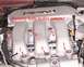 1998 Ford Taurus - Close-up of an engine intake manifold showing numbered bolts and removal instructions.