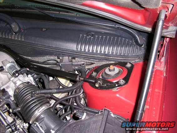 Engine bay strut tower and intake manifold
