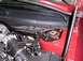 1998 Ford Taurus - Close-up view of the engine bay, focusing on the strut tower and intake manifold components.