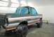 1996 Ford Bronco - Ford Bronco in paint booth, windows taped off, ready for paint work.
