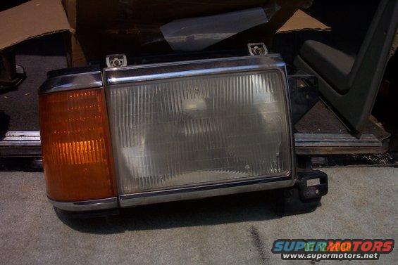 Headlight assembly with amber turn signal and chrome trim