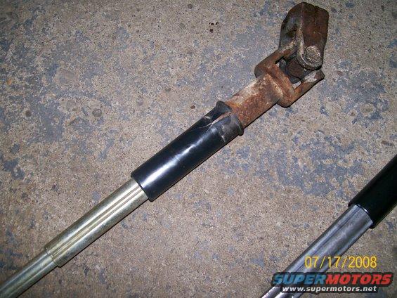 Steering shaft u-joint with rust and black tape