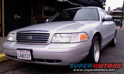 Silver 1998 Ford Crown Victoria front quarter view with California license plate