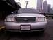 1998 Ford Crown Victoria - Front view of a silver 1998 Ford Crown Victoria with a California license plate.