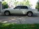 1998 Ford Crown Victoria - Side profile of a silver 1998 Ford Crown Victoria parked outdoors.