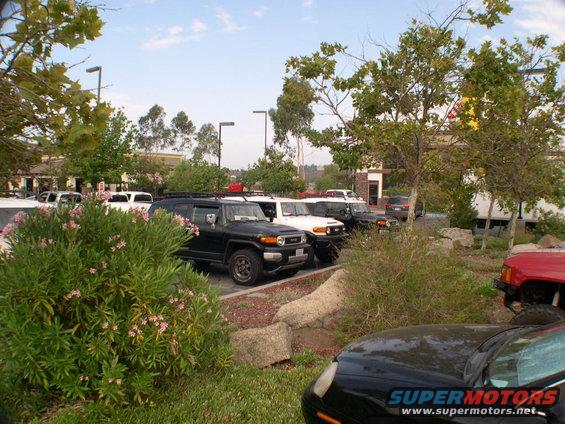 Black 2007 Toyota FJ Cruiser parked in a lot, front 3/4 view