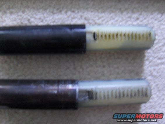 Two parts with visible gears and black casings