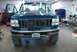 1996 Ford Bronco - Front view of a teal 1996 Ford Bronco, an aftermarket winch mounted on the bumper.