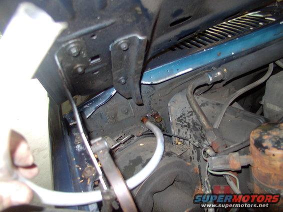 I like to slip a clear hose over one of the nipples and blow the coolant out of the core, into a container (saves the rug).