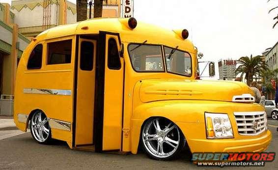 Yellow bus with chrome wheels and custom front end