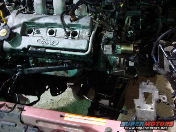 Getting the motor out. Radiator is removed, along with the distibutor and air box.