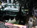 1994 Ford Probe - Getting the motor out. Radiator is removed, along with the distibutor and air box.