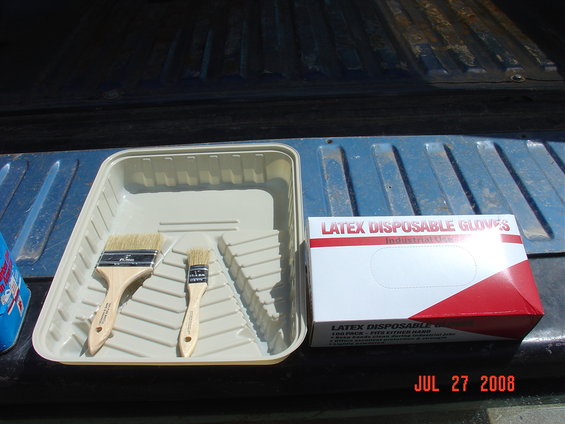 dsc00766.jpg Use a metal paint pan. The one in the picture is plastic and I used it for one side but it was trying to eat through the pan. Just pour in enough stripper for the area your working in. You can always add more stripper to the pan. 