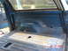 Rear passenger side. There is a big rust area in front of the rear wheel that will need to be fixed....