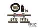1992 Ford Mustang - A collection of power steering components, including a cylinder, hoses, and various fittings, are laid out against a white background.
