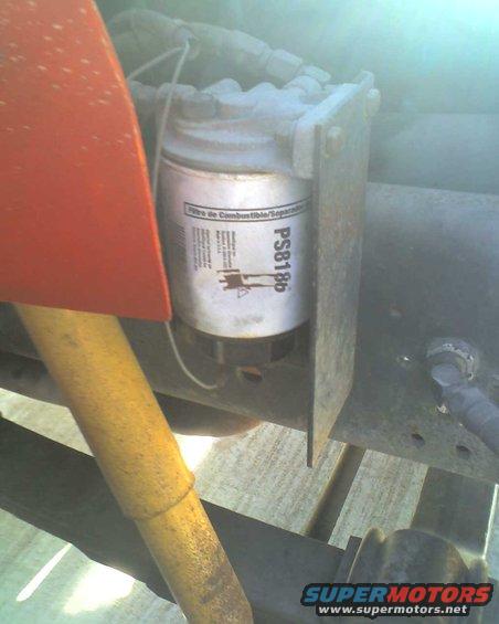 Fuel filter labeled PS8186 with French text 'Filtre de Combustible/Séparateur'