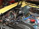 1978 Ford Ranchero - Close-up view of a vehicle's engine bay, showing various components and wiring.