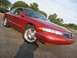 1996 Lincoln Mark VIII - This 1996 Lincoln Mark VIII is shown from a 3/4 front angle, parked on an asphalt surface.